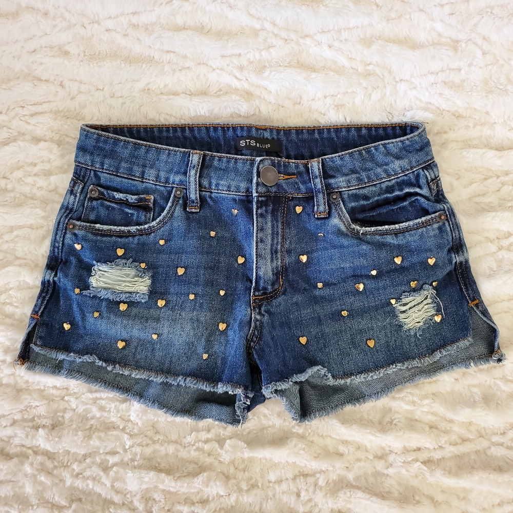 Heart studded destroyed denim shorts